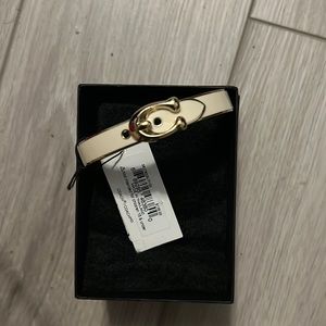Coach bracelet cream colored
